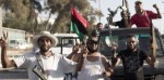 Des rebelles dans Tripoli, en Libye, en août 2011.