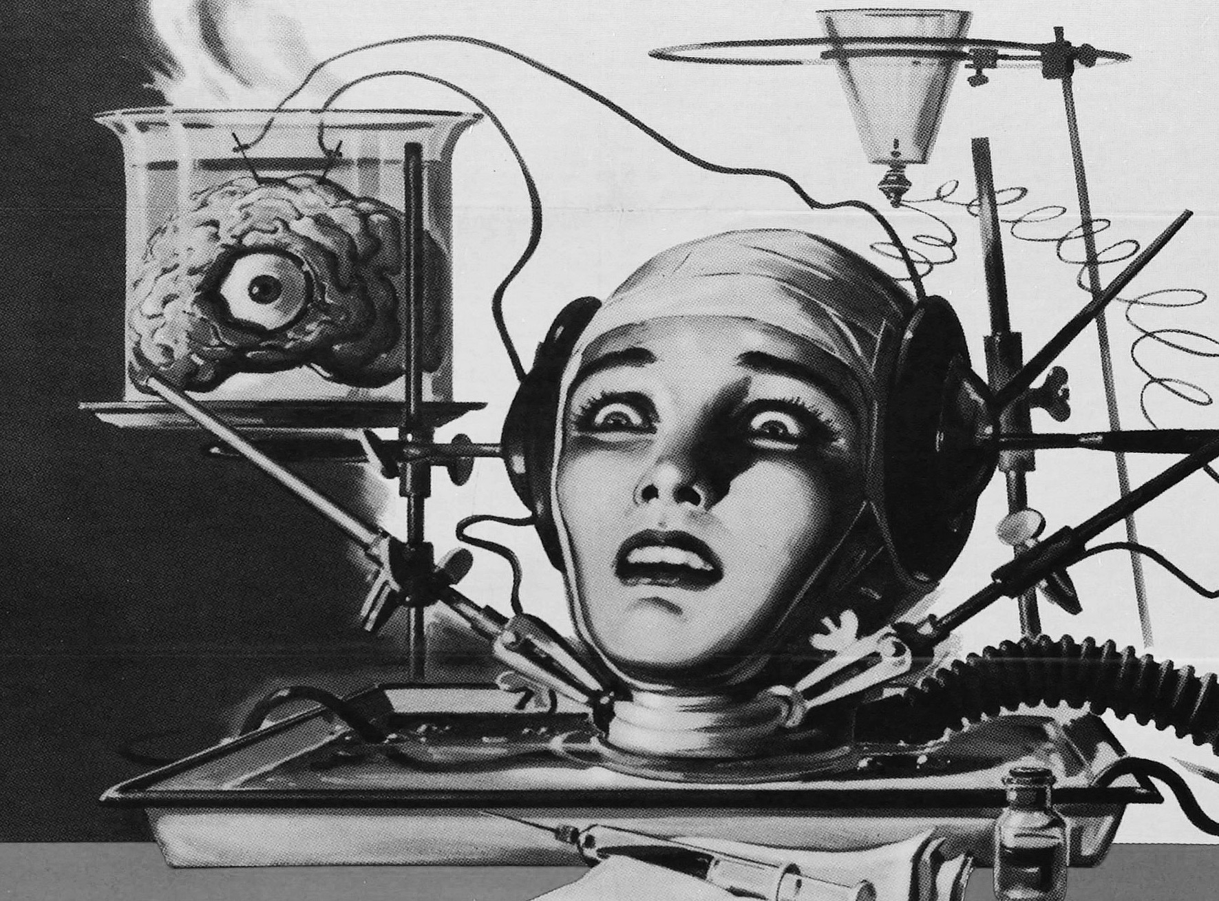 Détail de l’affiche du film de Joseph Green, sorti en 1962, « Le Cerveau qui ne voulait pas mourir ». On voit une tête entourée d'éléments technologiques qui la relie a un cerveau dans un bocal à gauche.