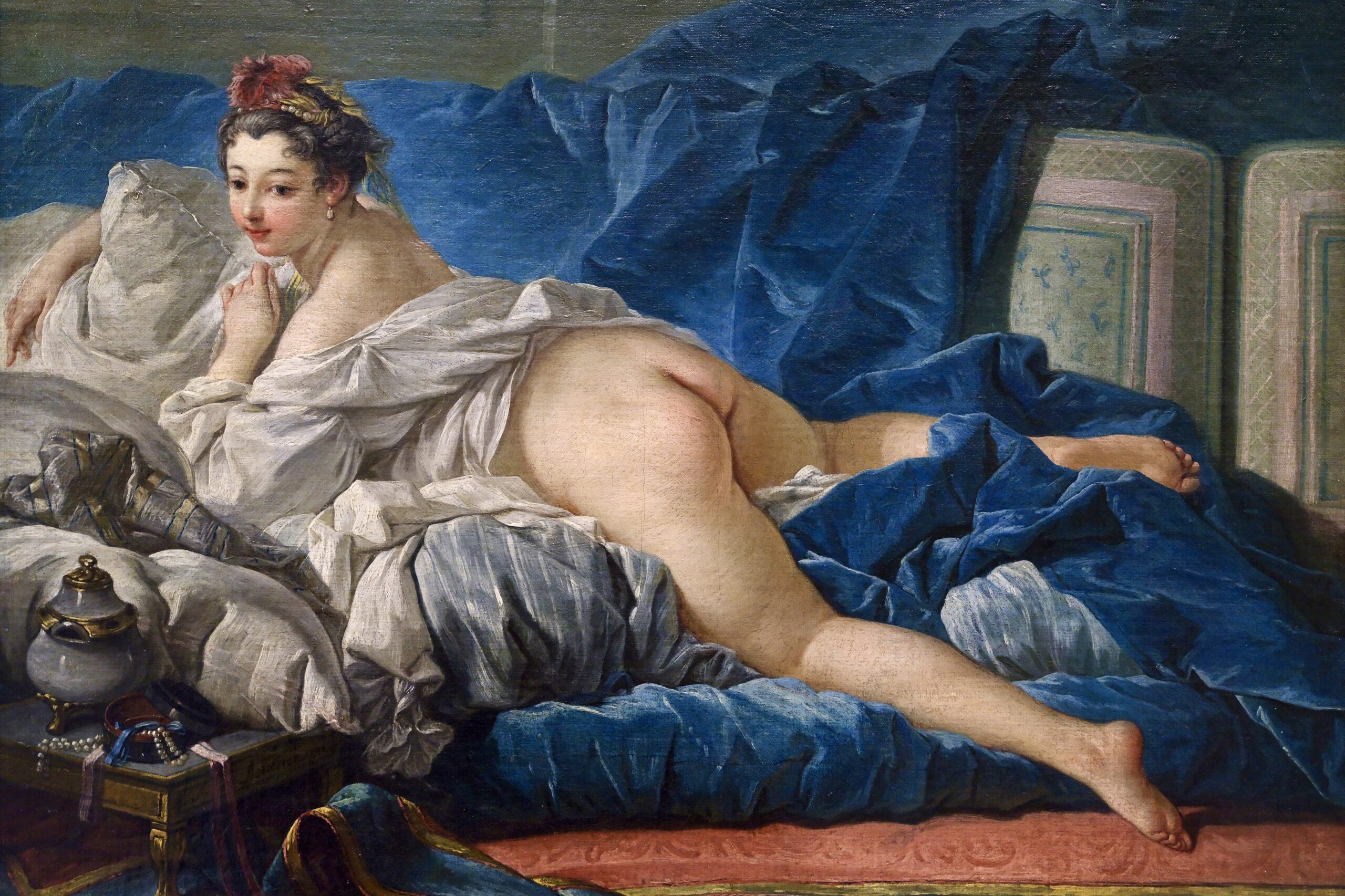 François Boucher, « L’Odalisque », peinture de 1745, représente une femme nue allongée sur un lit.